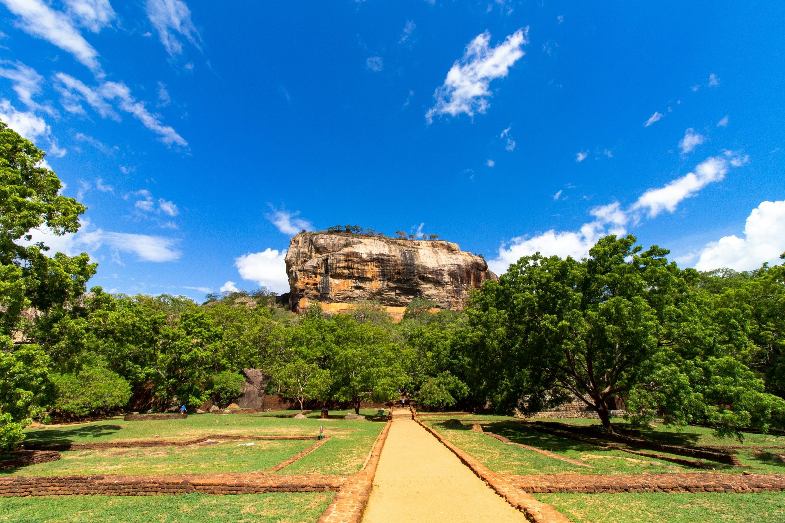Sigiriya rock fortress rising above the surrounding forest